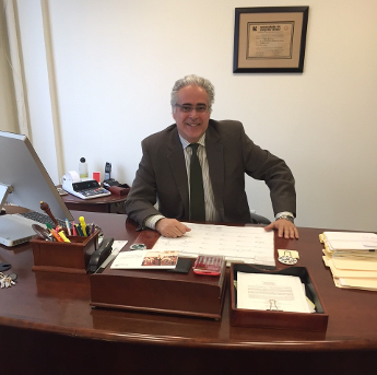 Roger at His Desk